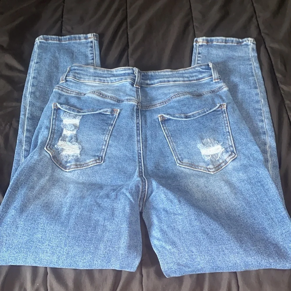 Distressed Blue Jeans